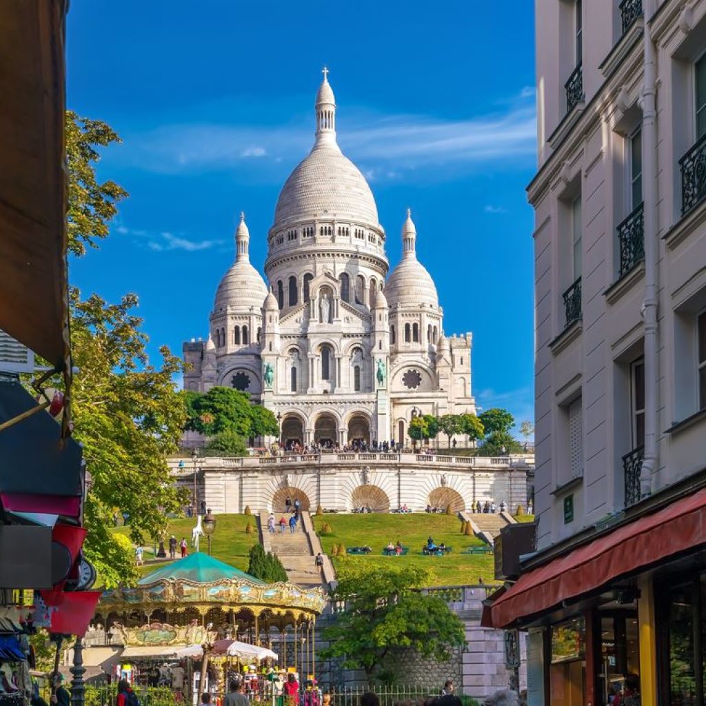 sacre coeur cathedral on montmartre hill in paris